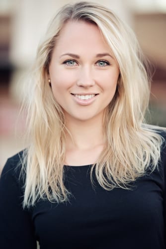 confident blonde girl smiling and clear from acne